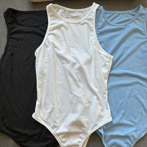 Never been worn- 3 Bodysuits